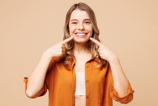 Woman smiling — Florida Blue dental insurance plans for 2026